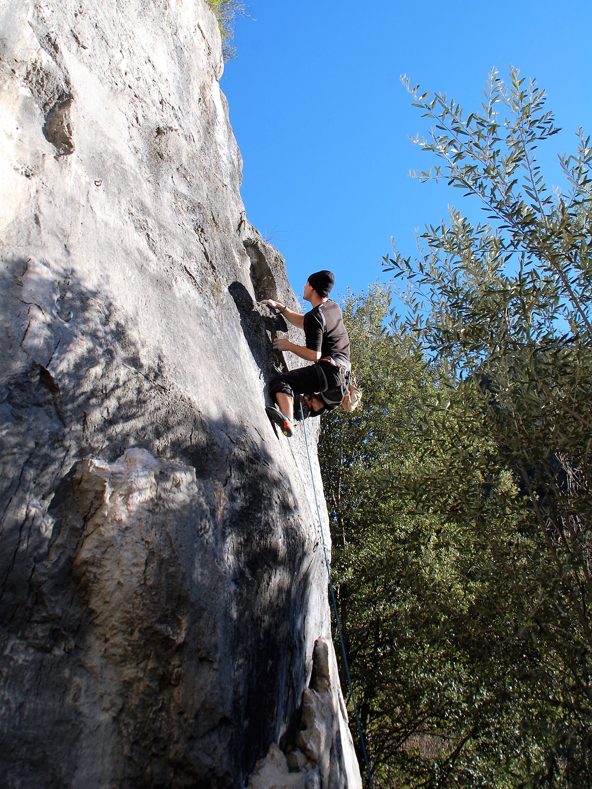 Kristian De Marchi at the crux of Nada Mas (7a)