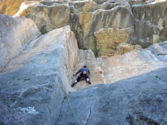 A climber on Tetto Bang (5a)