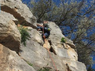 Stefano at the end of Trakkillozzo (a benchmark 5c+)